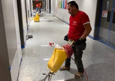 Professional marble floor polishing and maintenance by Marble Lite Inc with a technician using specialized equipment to restore shine on marble floors